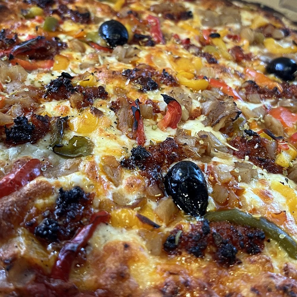 Pizza Espagnole de Flo Pizza : chorizo, poivrons, oignons